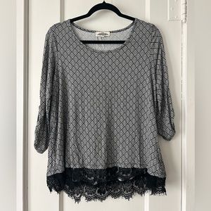 Black and White Blouse with Lace Trimming.